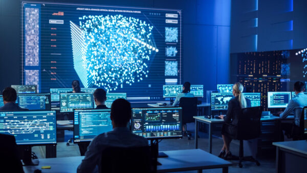 Cybersecurity professionals monitoring network data and advanced AI systems in a high-tech control room, featuring Check Point Smart Console interface on multiple computer screens and a large central data visualization wall, Check Point Smart Console training