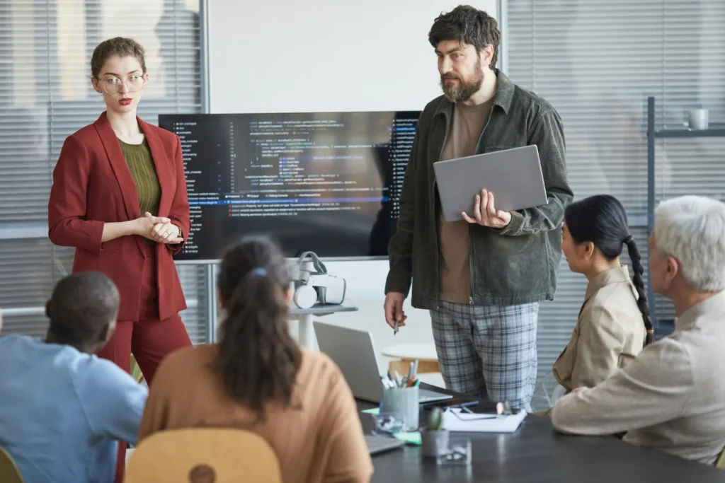 IT professionals attending an instructor-led Nutanix training session in a modern classroom setting, Nutanix courses.